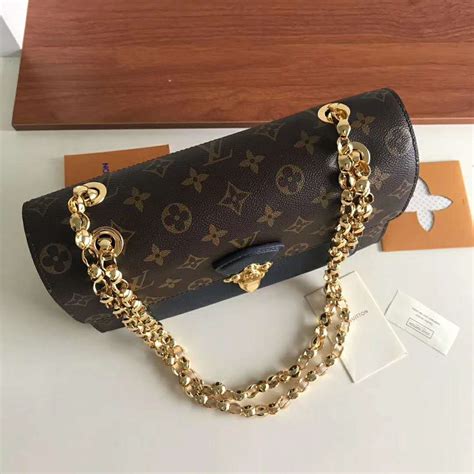 louis vuitton chain bag.